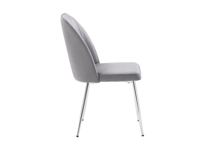 Grey velvet dining room chairs, set of 2, featuring sleek metal legs, plush upholstery, and a modern design. Ideal for contemporary dining spaces, these chairs offer both comfort and style.
