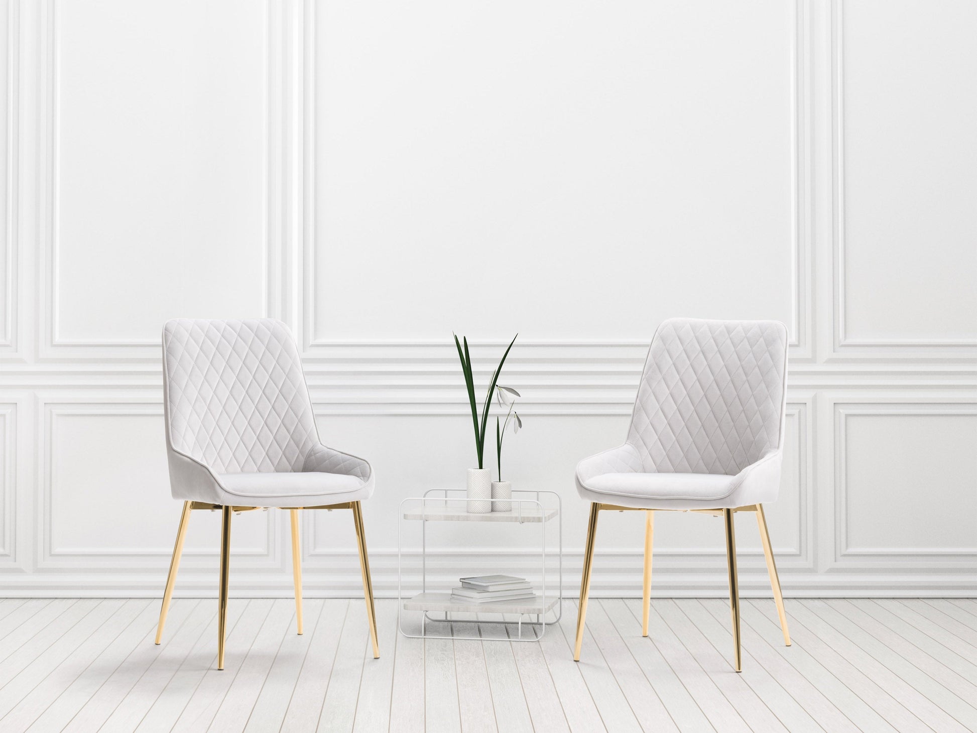 Light grey velvet dining chairs, set of 2, with tufted backrest, gold metal legs, and contemporary design. Perfect for modern dining rooms or kitchens. Luxurious and elegant seating solution.