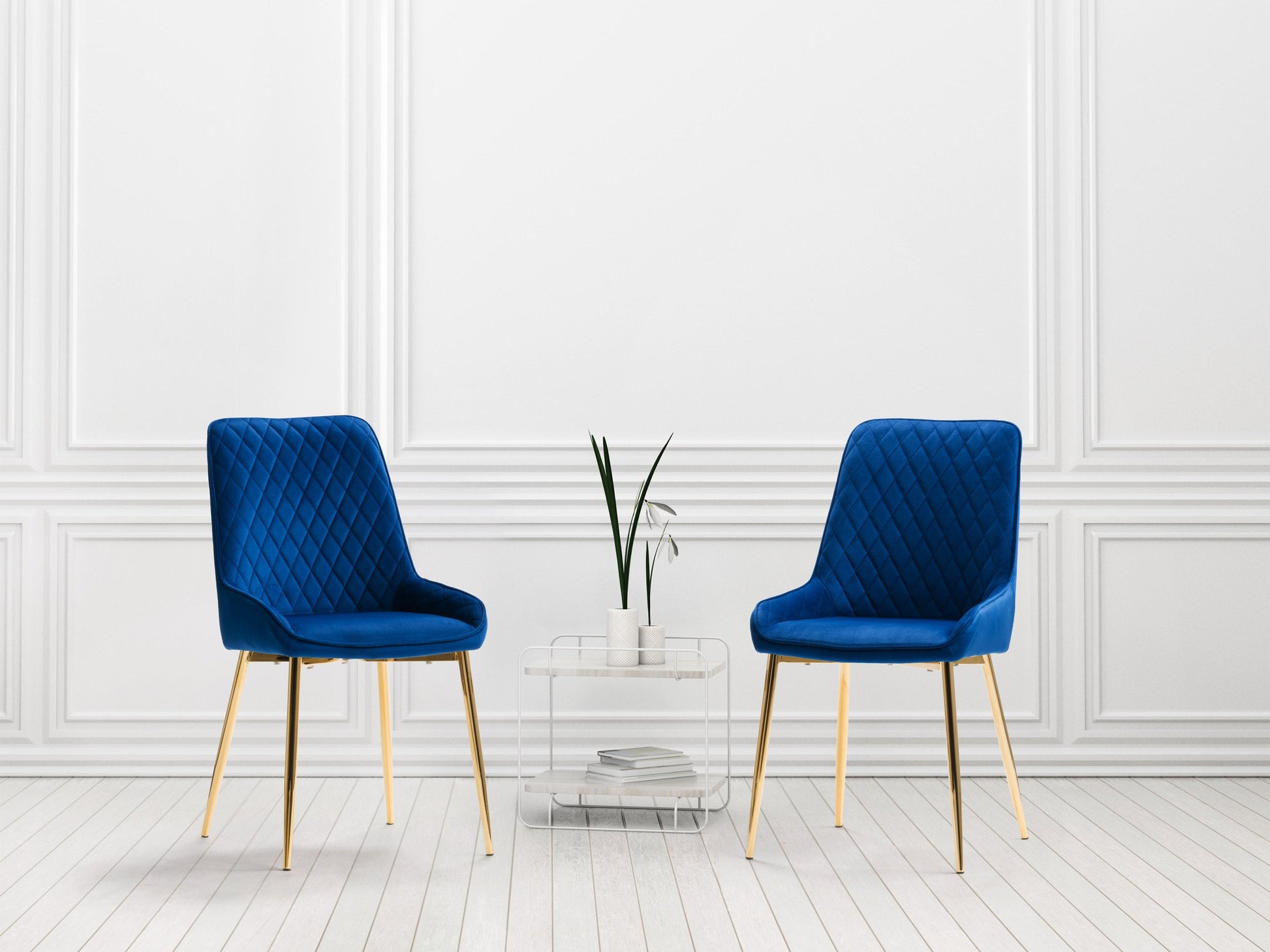 Navy blue velvet dining chairs set of 2 with gold metal legs, tufted backrest, and ergonomic design for modern dining rooms.