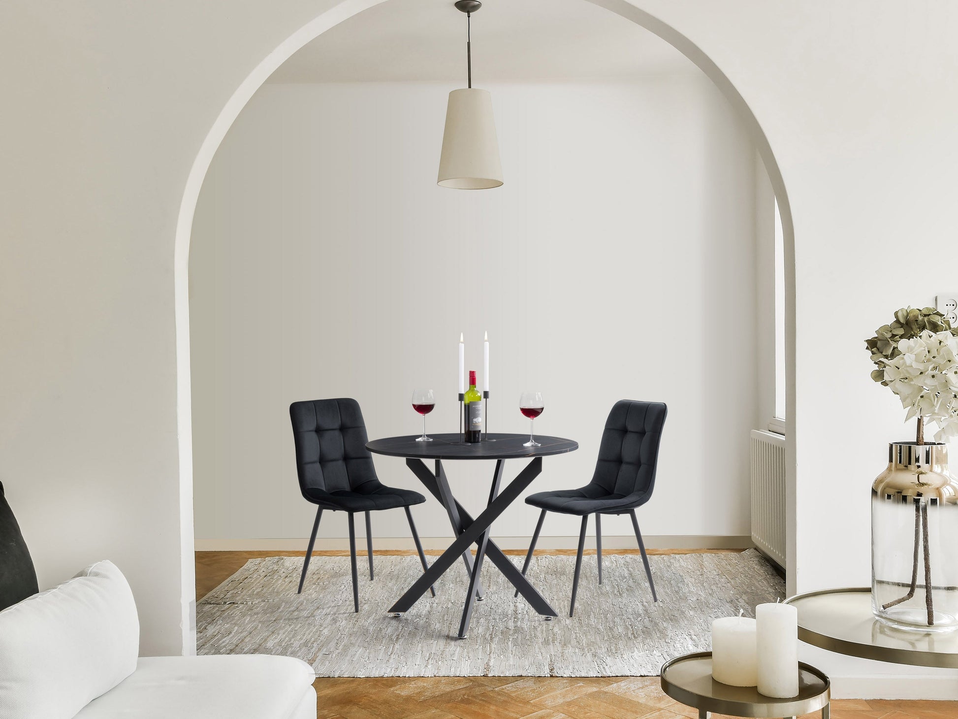 Black velvet upholstered dining chairs, set of 2, featuring sleek gold metal legs, plush cushioning, and a modern design perfect for contemporary dining rooms or elegant kitchen spaces.