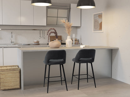 Black velvet bar stools set of 2 with gold metal legs, plush cushioning, and curved backrest for modern kitchen or bar decor.