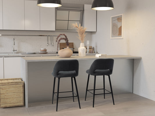 Black velvet bar stools set of 2 with gold metal legs, plush cushioning, and curved backrest for modern kitchen or bar decor.