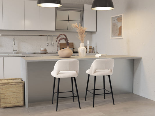 Cream velvet bar stools set of 2 with gold metal legs, tufted backrests, and cushioned seats, ideal for modern kitchen or home bar décor.