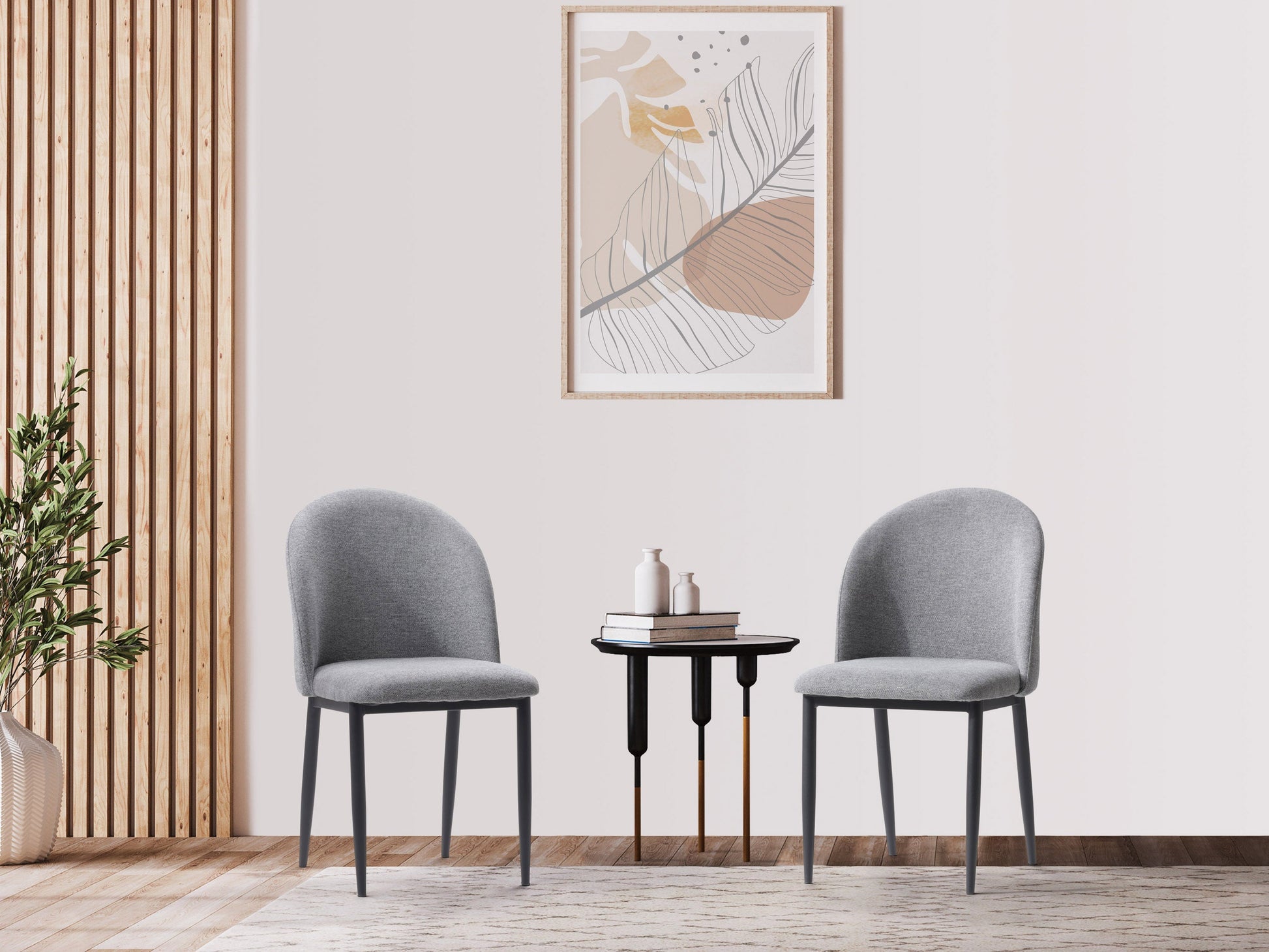 Set of 2 grey curved dining chairs with plush upholstery, sleek metal legs, and modern design, perfect for contemporary dining rooms, offering comfort and style with a minimalist aesthetic.