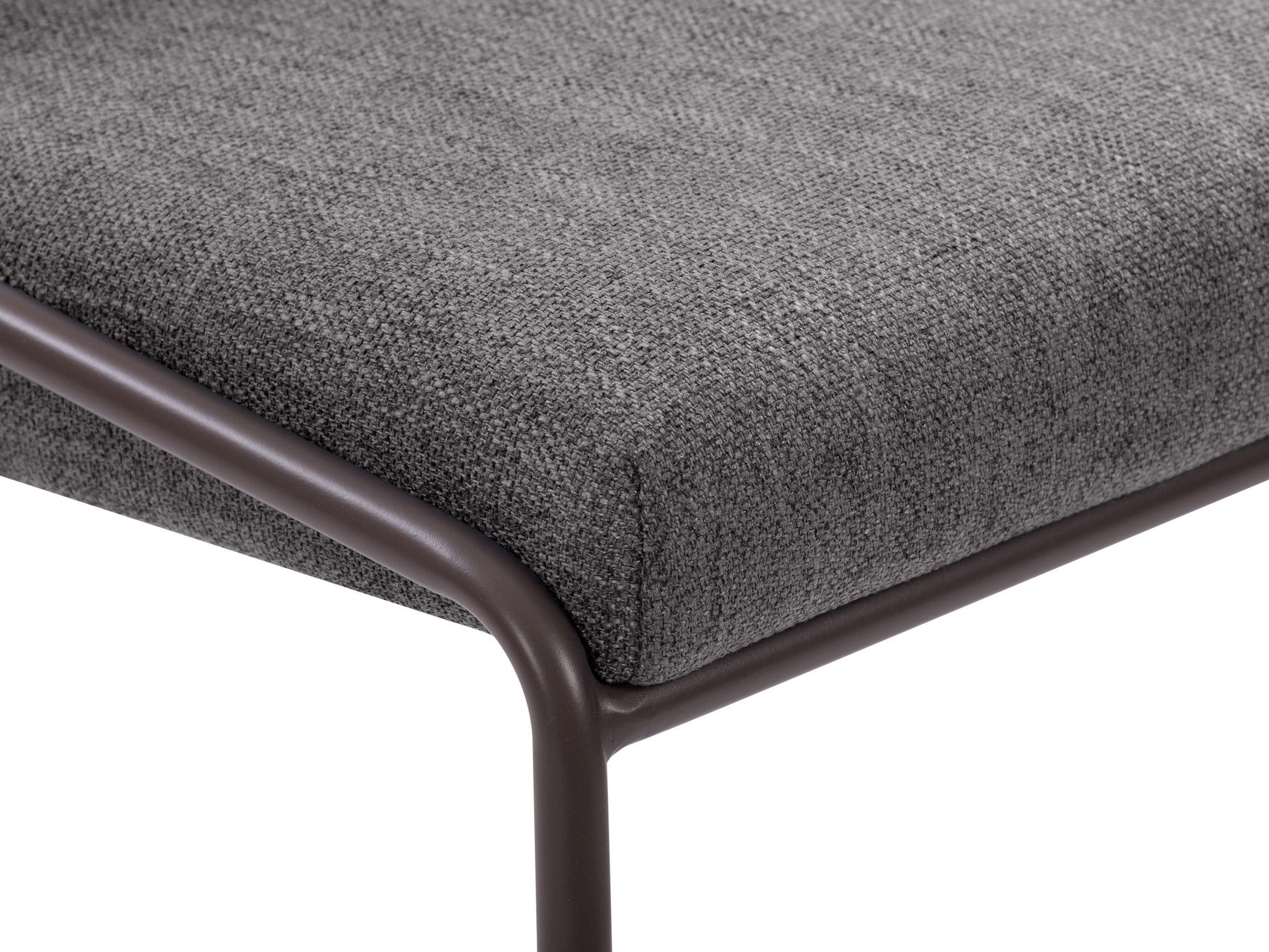 Dark grey modern bar stool with sleek metal legs, cushioned seat, and curved backrest; ideal for contemporary kitchen or bar settings.