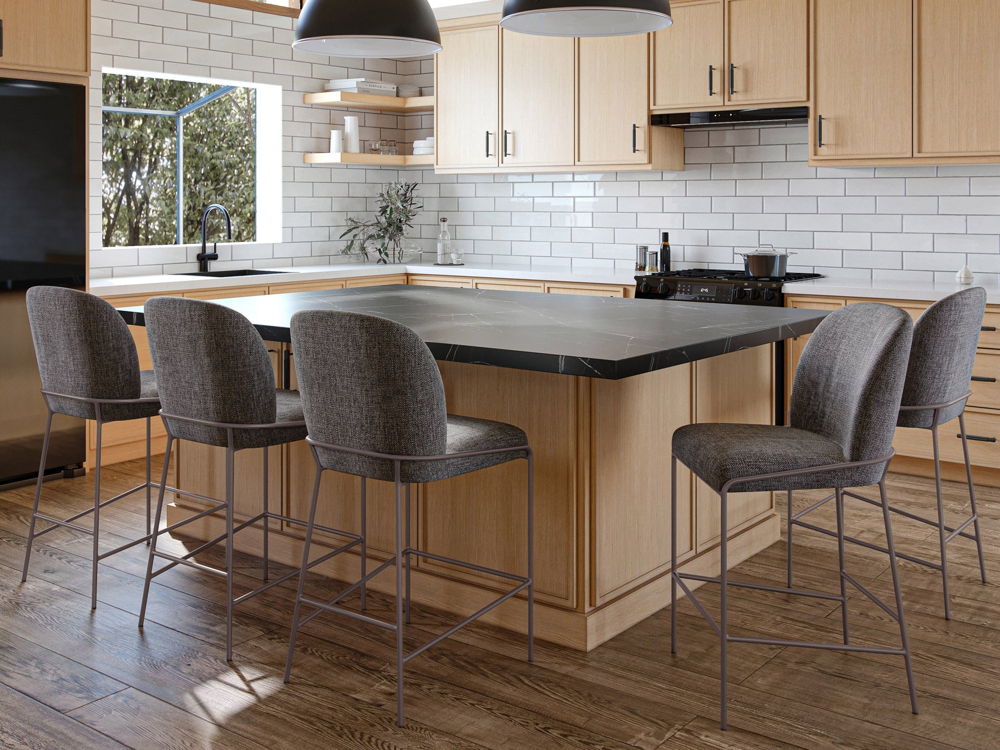 Dark grey modern bar stool with sleek metal legs, cushioned seat, and curved backrest; ideal for contemporary kitchen or bar settings.
