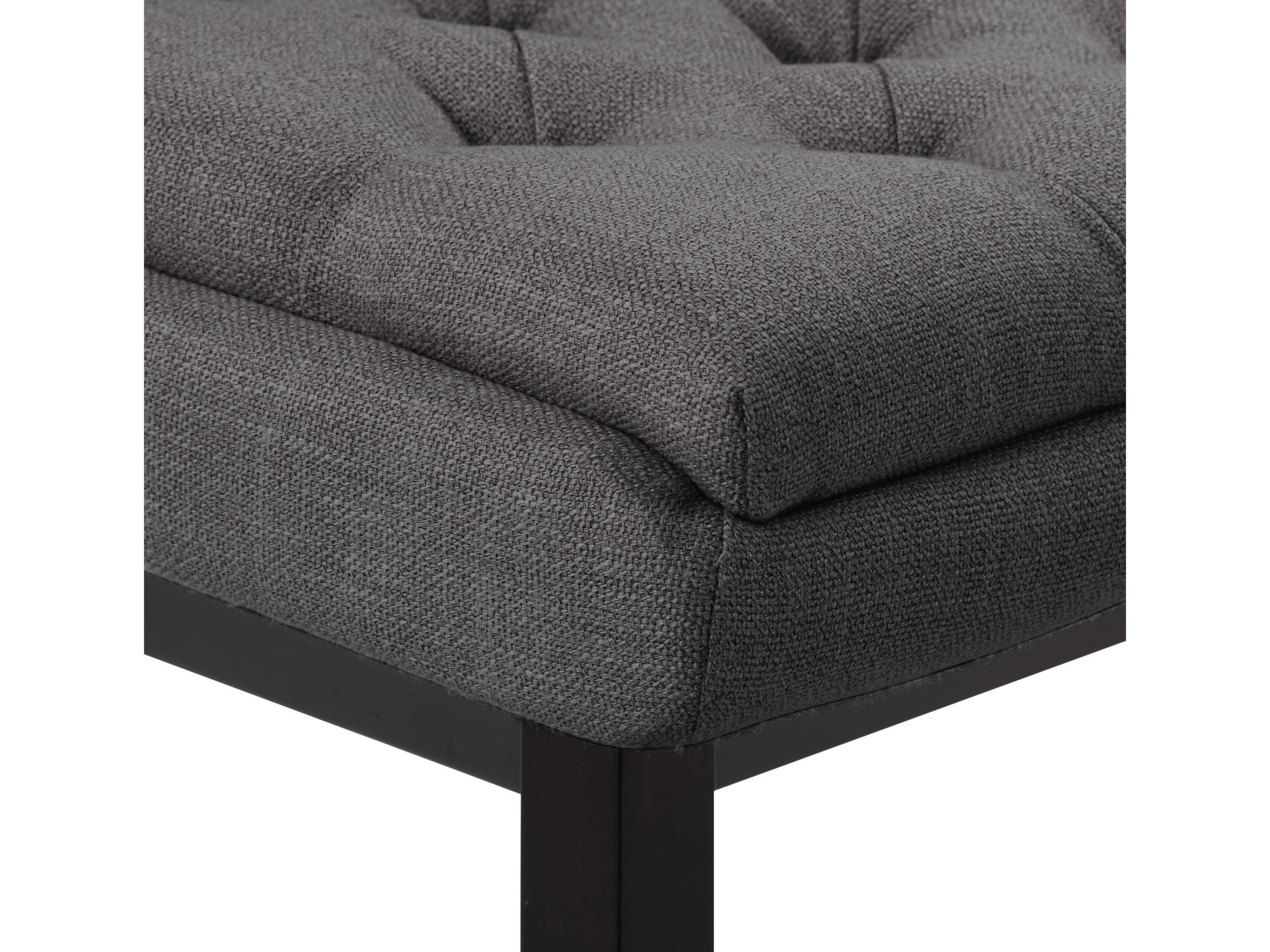 Dark grey button tufted bar stools with wooden legs and footrest, featuring plush fabric upholstery and a classic design, perfect for modern and contemporary kitchen or bar settings.