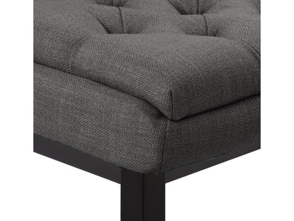Dark grey button tufted bar stools with wooden legs and footrest, featuring plush fabric upholstery and a classic design, perfect for modern and contemporary kitchen or bar settings.