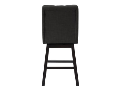 Dark grey button tufted bar stools with wooden legs and footrest, featuring plush fabric upholstery and a classic design, perfect for modern and contemporary kitchen or bar settings.