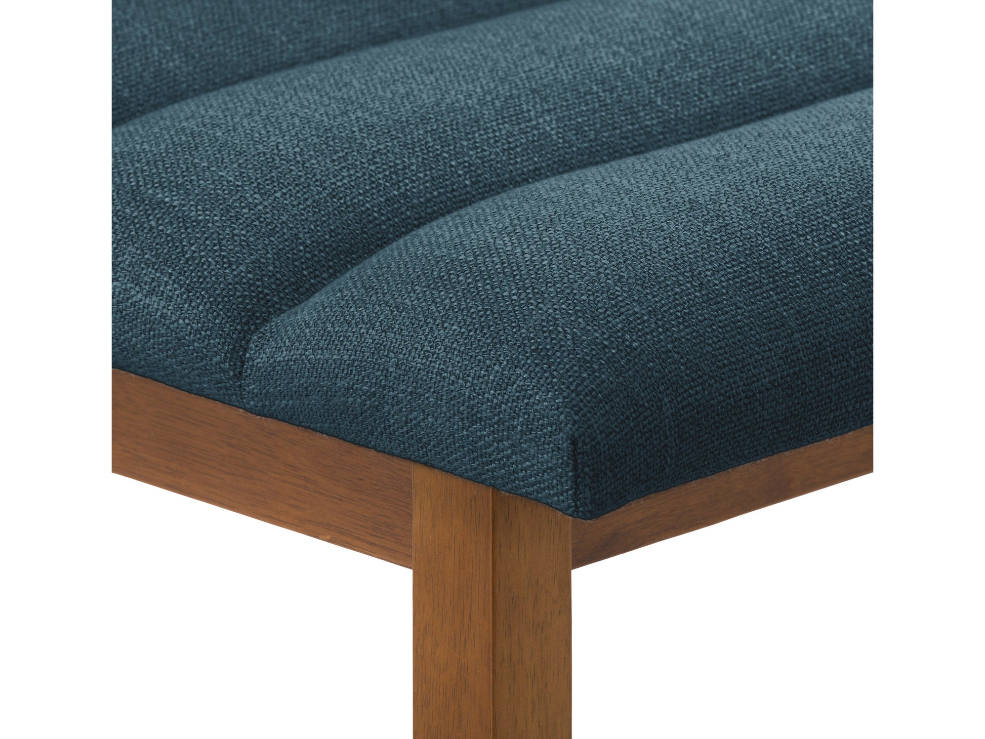 Blue channel tufted bar stools with black metal legs, featuring plush velvet upholstery and a modern design. Perfect for kitchen islands or home bars, combining comfort and style.