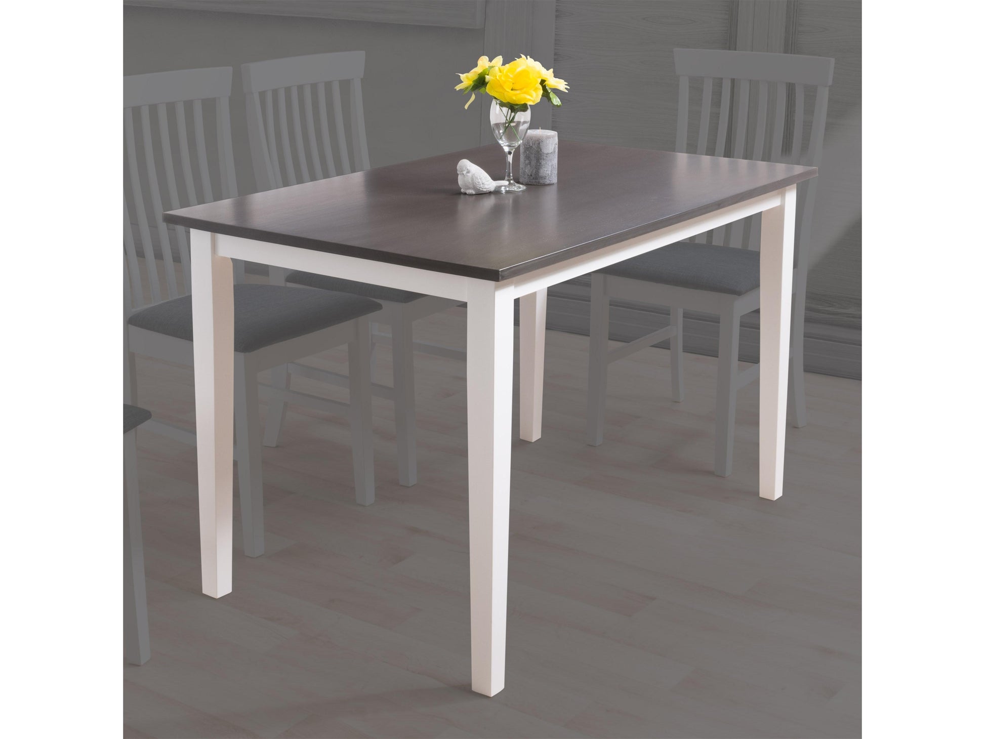 Grey and white dining table with sleek rectangular surface, modern metal legs, and smooth finish, perfect for contemporary dining rooms.