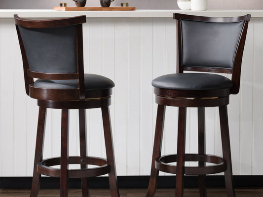 Set of 2 black bar height bar stools with sleek metal frames, cushioned seats, and footrests. Modern design with durable materials ideal for kitchen islands or home bars.