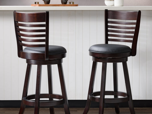 Set of 2 black bar height bar stools with sleek metal frames, cushioned seats, and footrests. Modern design with durable materials ideal for kitchen islands or home bars.