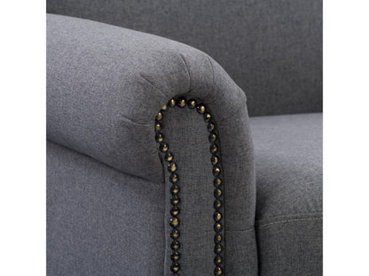Grey armchair with plush upholstery, sleek wooden legs, and tufted backrest. The chair features a modern design with comfortable armrests, perfect for living rooms or offices.