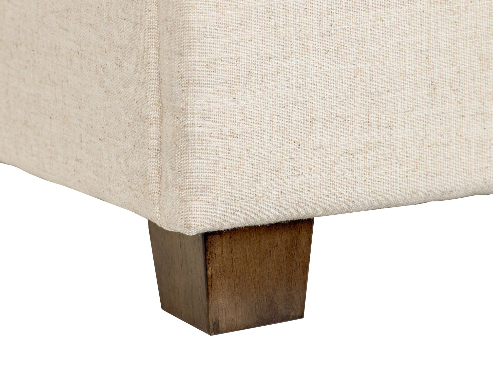 Beige large storage ottoman with tufted top, linen fabric, wooden legs, and spacious interior compartment for extra storage.