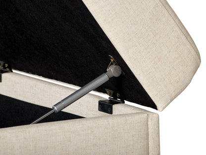 Beige large storage ottoman with tufted top, linen fabric, wooden legs, and spacious interior compartment for extra storage.