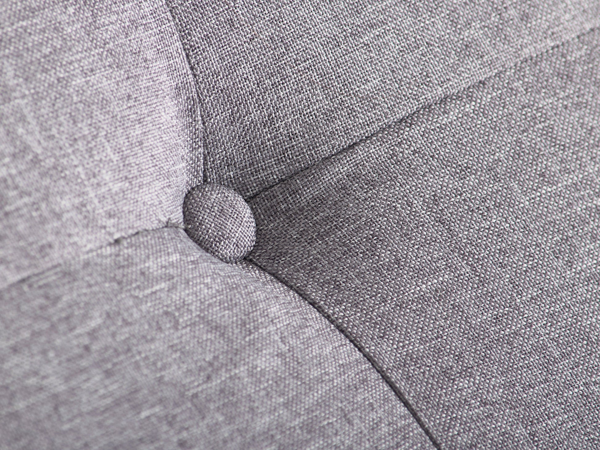 Light grey large storage ottoman with tufted top, soft fabric upholstery, and wooden legs. Ideal for living rooms or bedrooms, providing extra seating and hidden storage space.