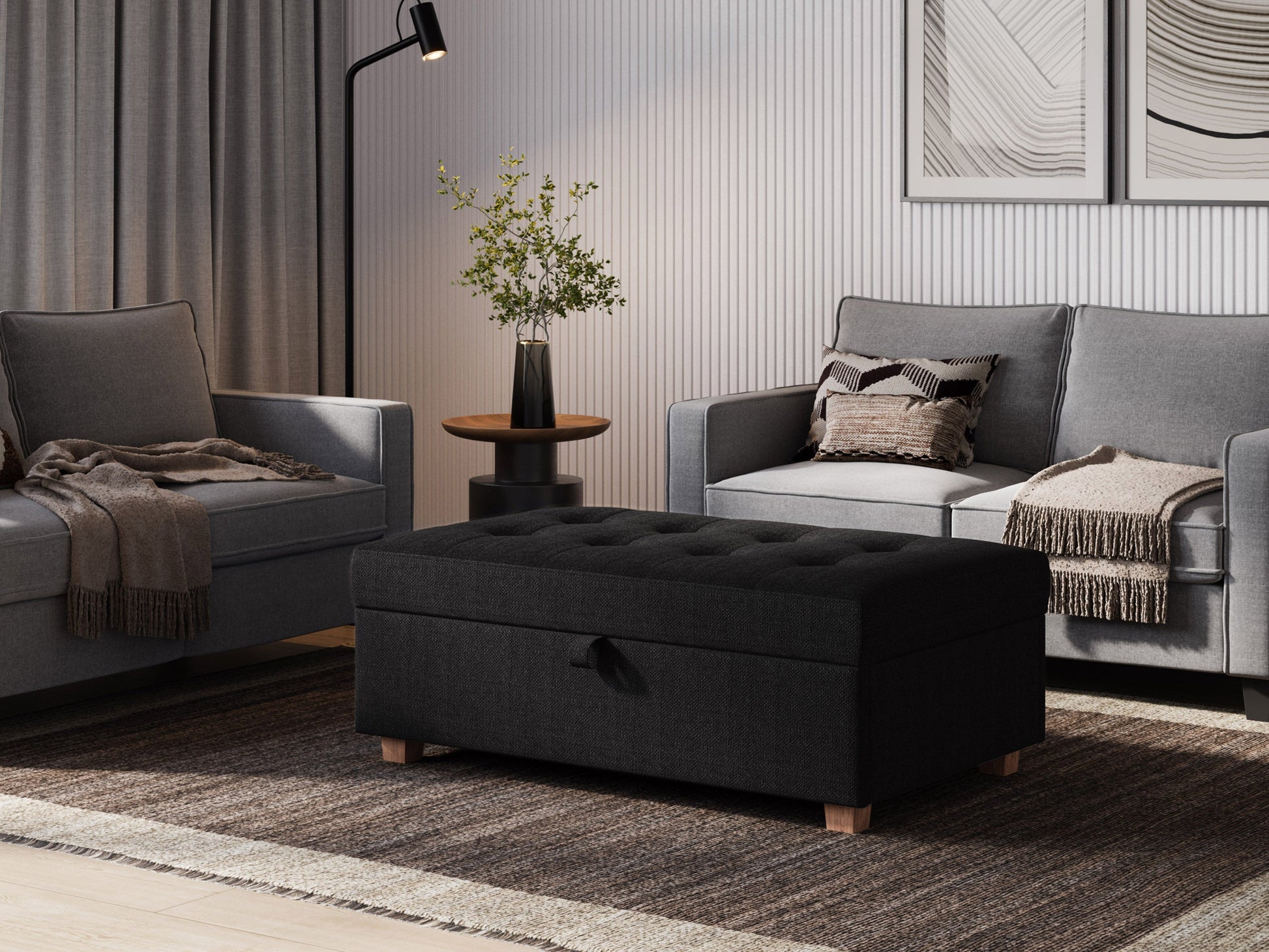 Dark grey large storage ottoman with tufted top, soft fabric upholstery, and spacious interior storage compartment. Ideal for living room, bedroom, or entryway as a stylish and functional furniture piece.