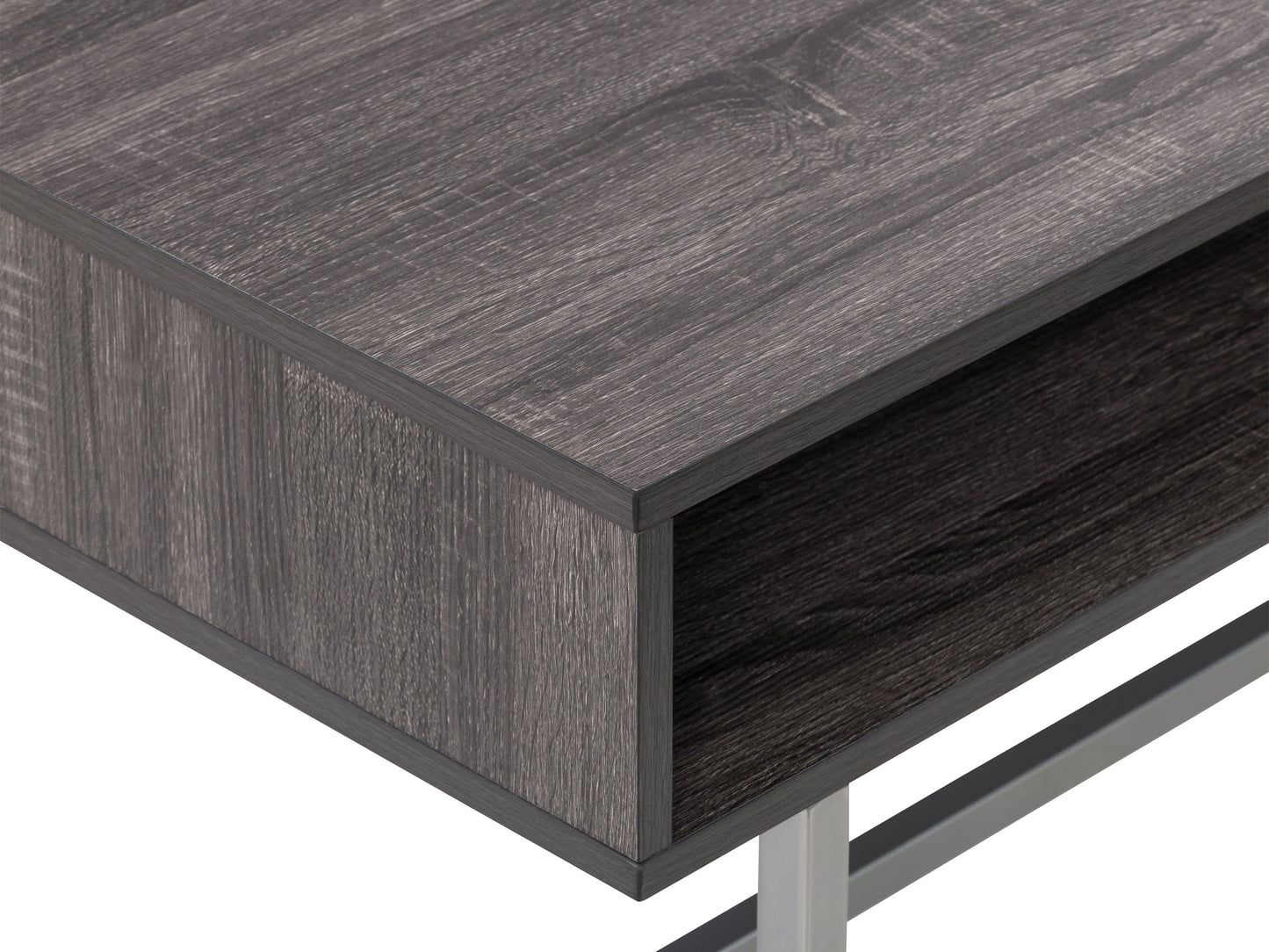 Modern rectangular coffee table in grey with a sleek, minimalist design featuring a smooth, matte finish, sturdy metal legs, and a spacious surface perfect for living rooms or offices.