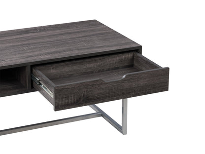 Modern rectangular coffee table in grey with a sleek, minimalist design featuring a smooth, matte finish, sturdy metal legs, and a spacious surface perfect for living rooms or offices.