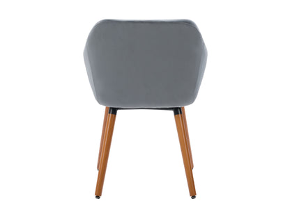 Set of 2 grey velvet dining chairs with tufted backs, sleek black metal legs, and plush cushioning for modern dining rooms.