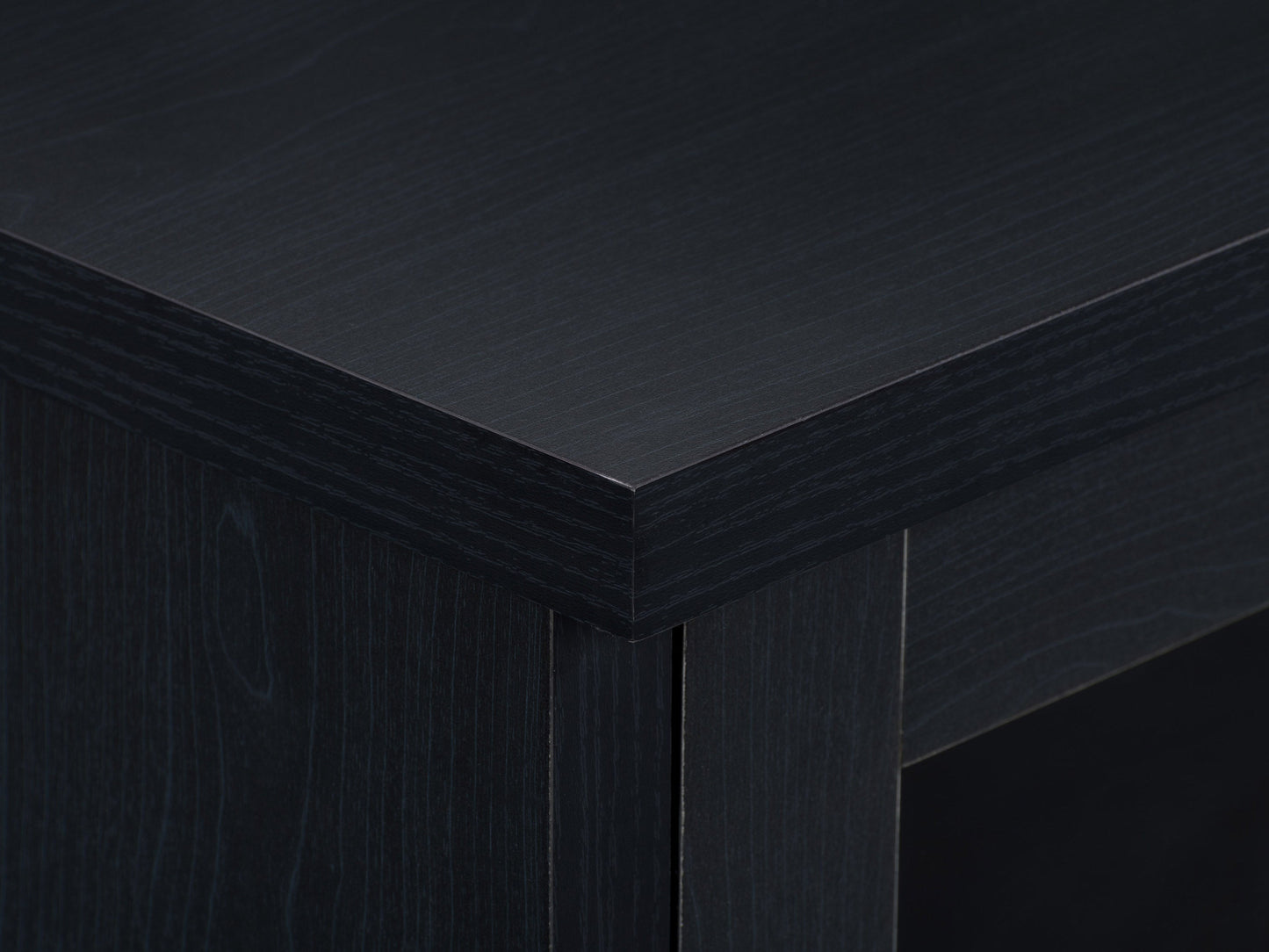 Black TV stand for TVs up to 95 inches, featuring sleek modern design, sturdy wooden material, open shelving for media devices, and cable management system for a clutter-free setup.