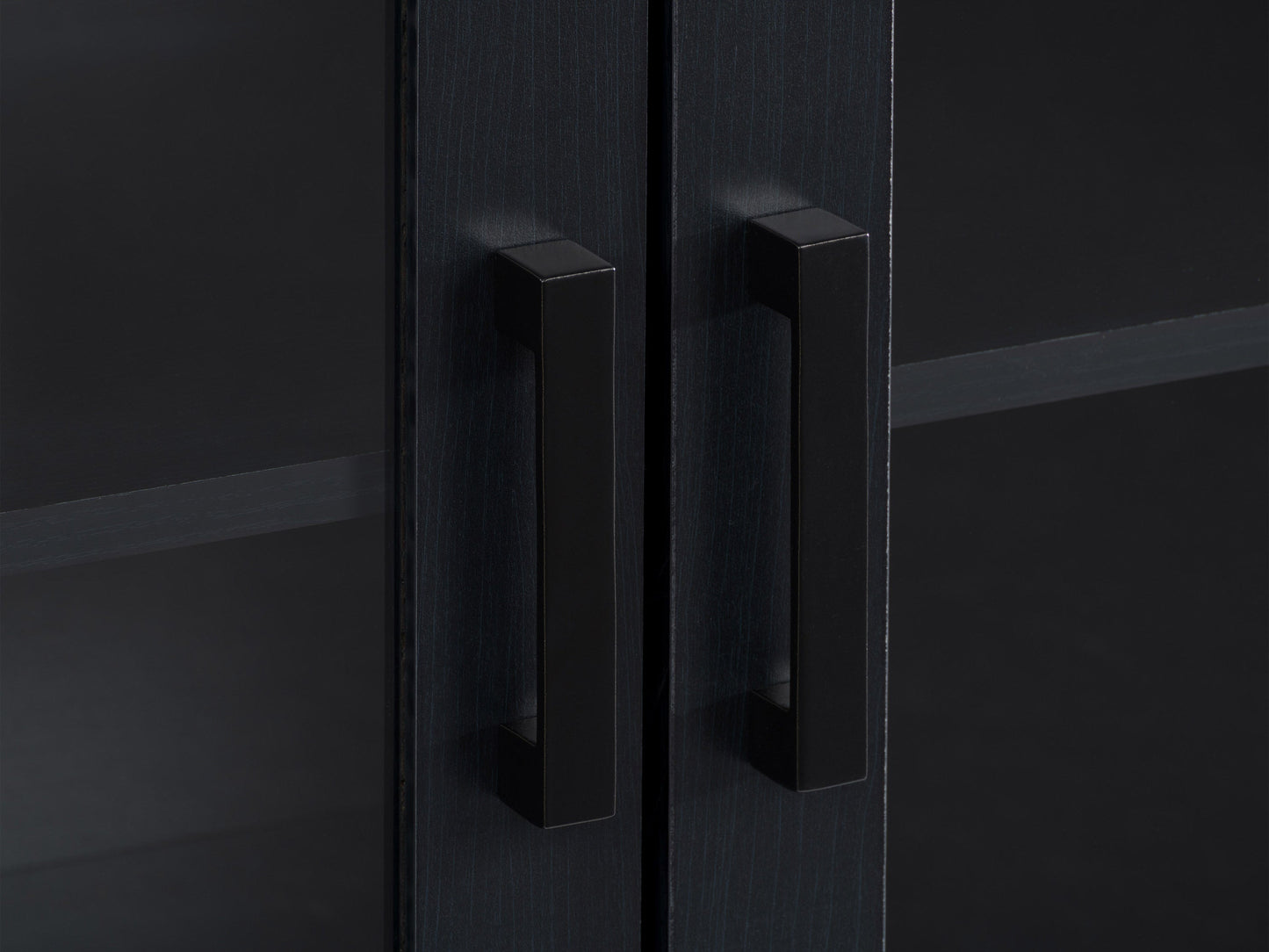 Black TV stand for TVs up to 95 inches, featuring sleek modern design, sturdy wooden material, open shelving for media devices, and cable management system for a clutter-free setup.