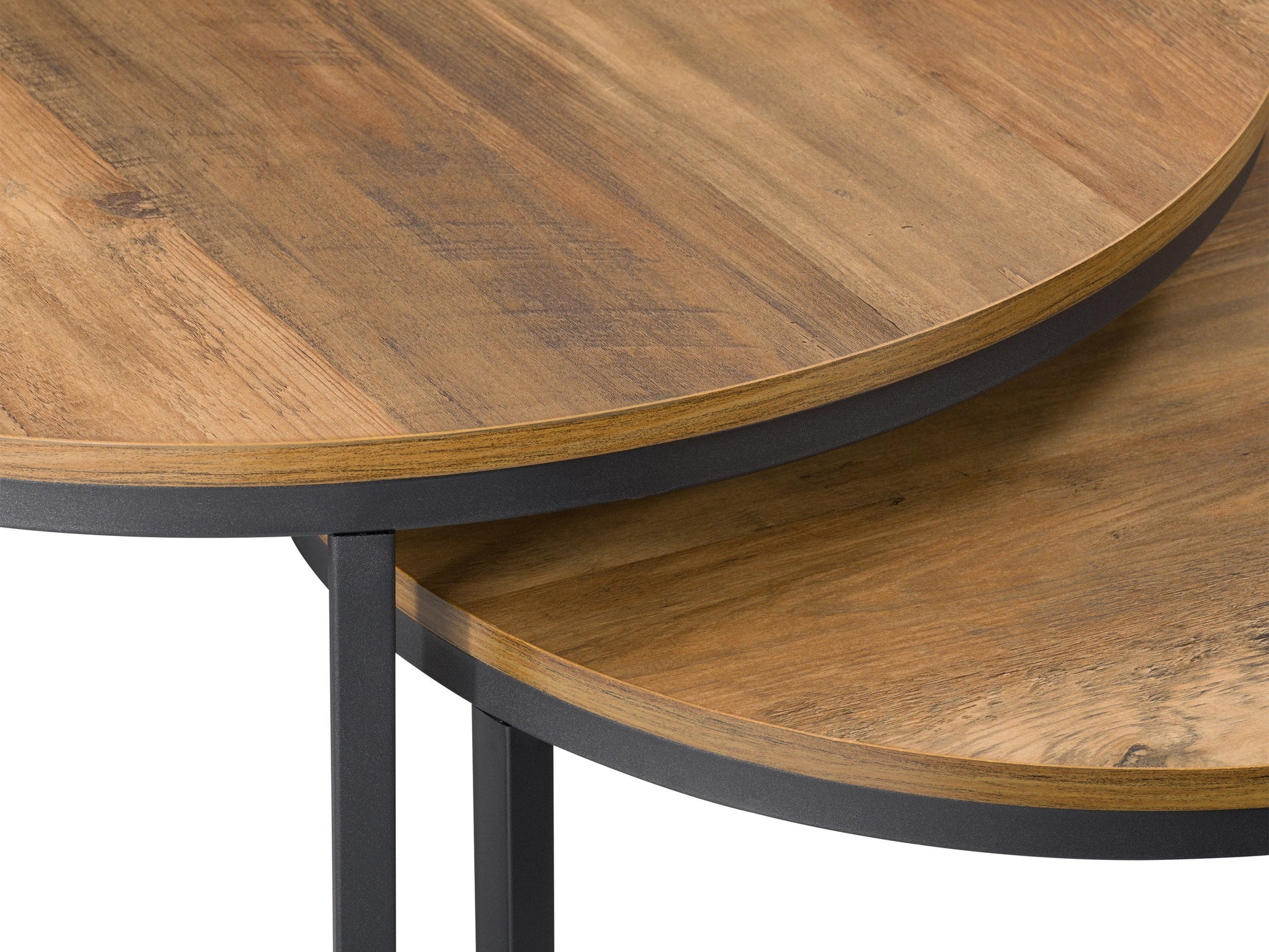 Round nesting coffee tables with brown wood tops, black metal legs, and a modern minimalist design. The larger table has a smooth surface, while the smaller table can be tucked underneath for space-saving versatility.