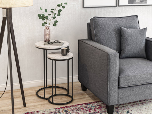 White marble round nesting side tables with gold metal frames, sleek modern design, and smooth polished surfaces, perfect for living room or bedroom decor.
