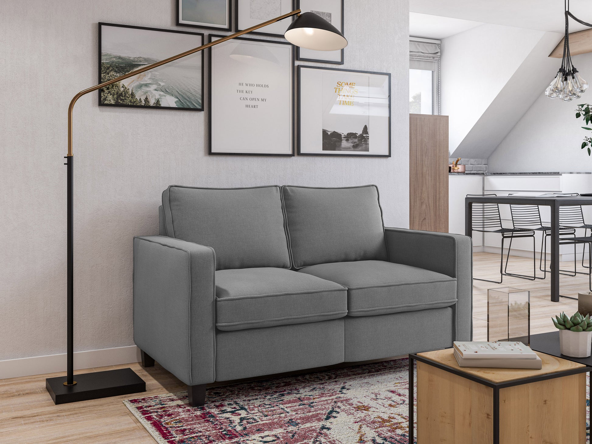 Modern 2-seater loveseat in grey fabric with plush cushions, wooden legs, and sleek armrests. Ideal for contemporary living rooms.