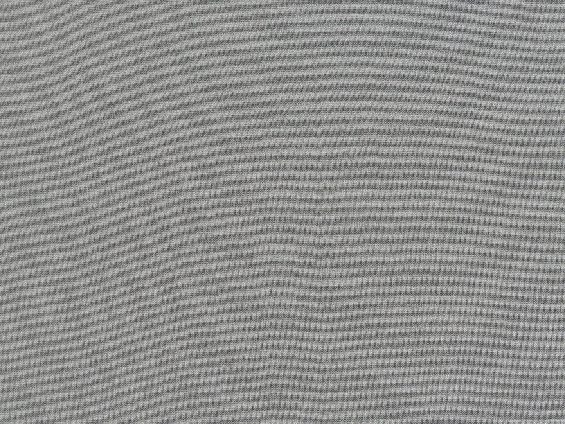 Light grey fabric ottoman with tufted top, wooden legs, and soft texture; ideal for living room seating or storage.