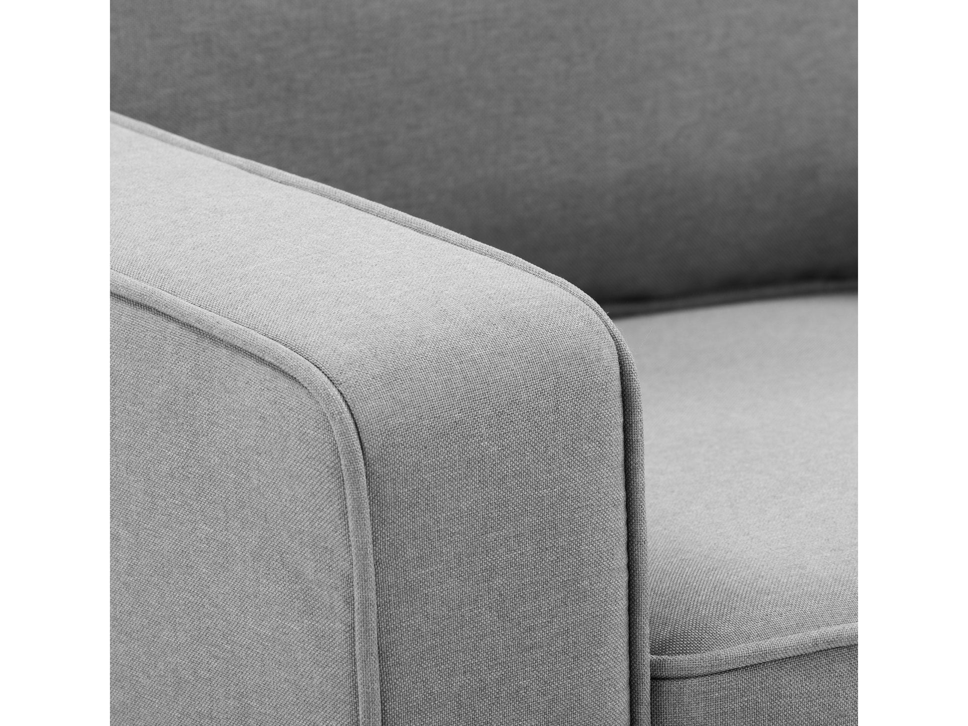 Light grey 3-seater sofa with plush cushions, wooden legs, and soft fabric upholstery. Ideal for modern living rooms, this stylish couch offers comfort and elegance, perfect for family gatherings or relaxation.