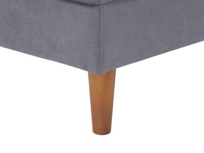 Grey mid-century modern ottoman with wooden legs, upholstered in soft fabric. Features a minimalist design with tufted top cushion and sturdy construction, perfect for living room or office decor.