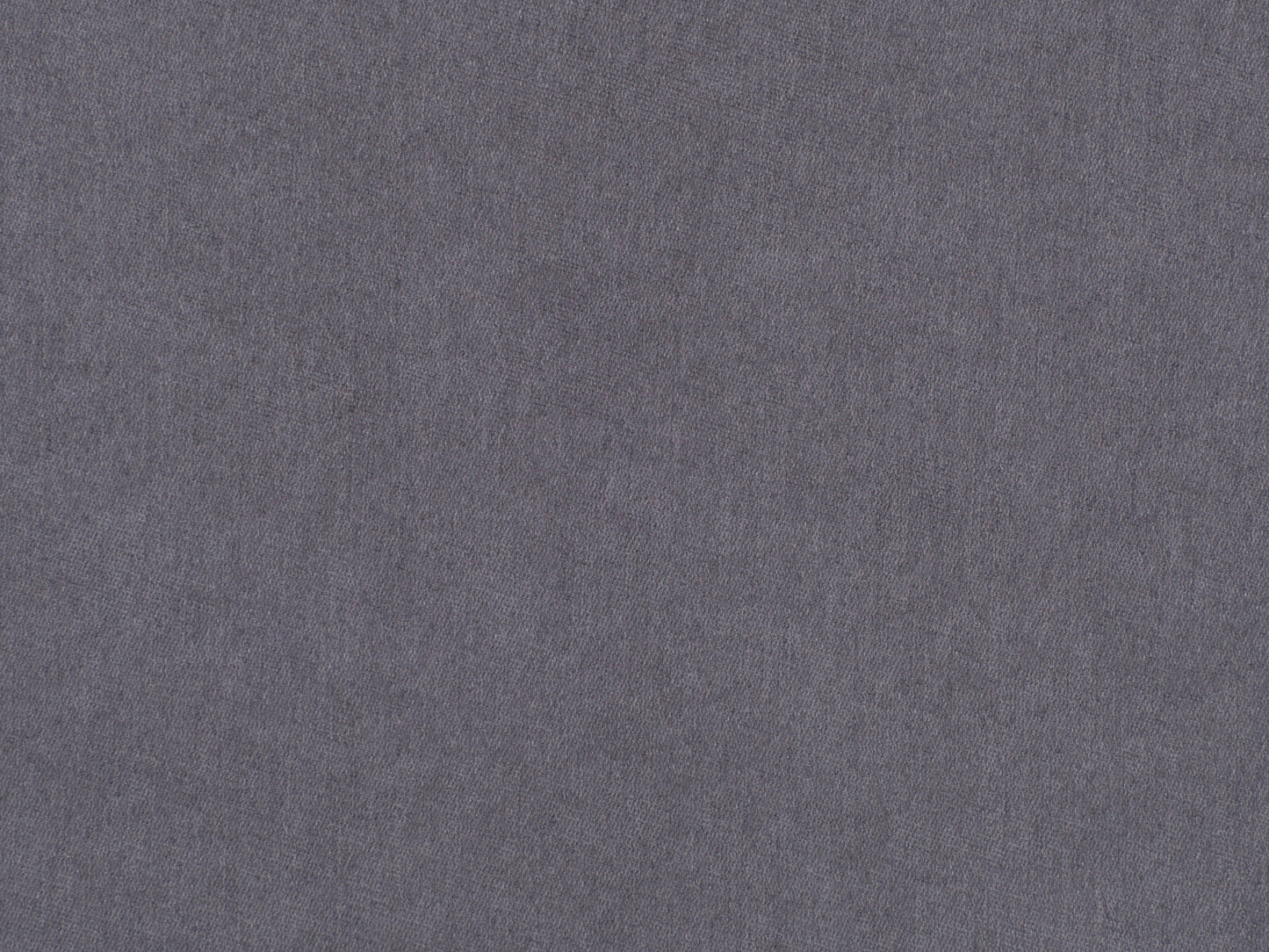 Grey mid-century modern ottoman with wooden legs, upholstered in soft fabric. Features a minimalist design with tufted top cushion and sturdy construction, perfect for living room or office decor.