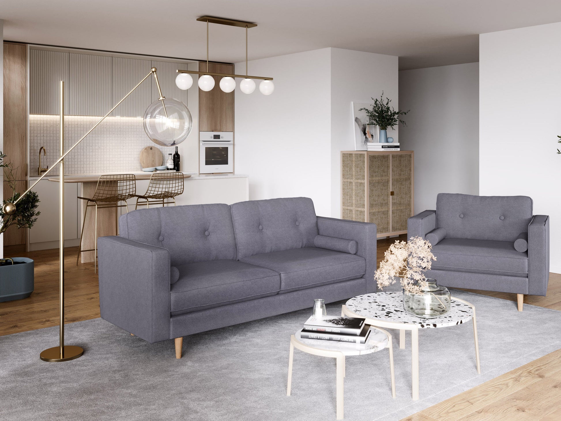 Three-seater grey fabric sofa with plush cushions, modern design, and sleek metal legs, perfect for contemporary living rooms.