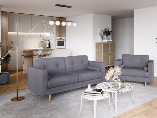 Three-seater grey fabric sofa with plush cushions, modern design, and sleek metal legs, perfect for contemporary living rooms.