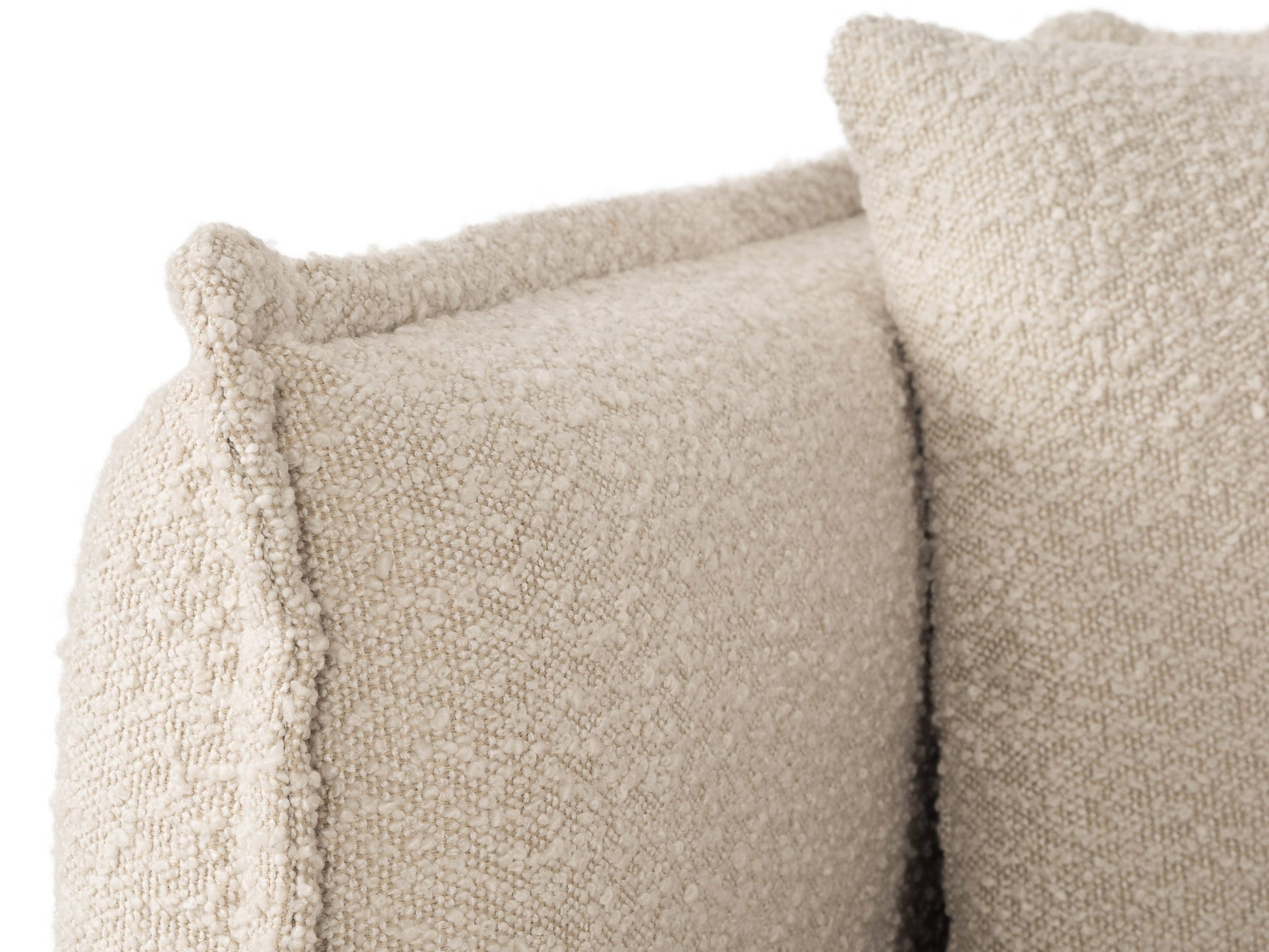 Modern boucle loveseat in cream, featuring soft textured fabric, sleek wooden legs, and plush cushioning for comfort and style, perfect for contemporary living rooms or cozy reading nooks.