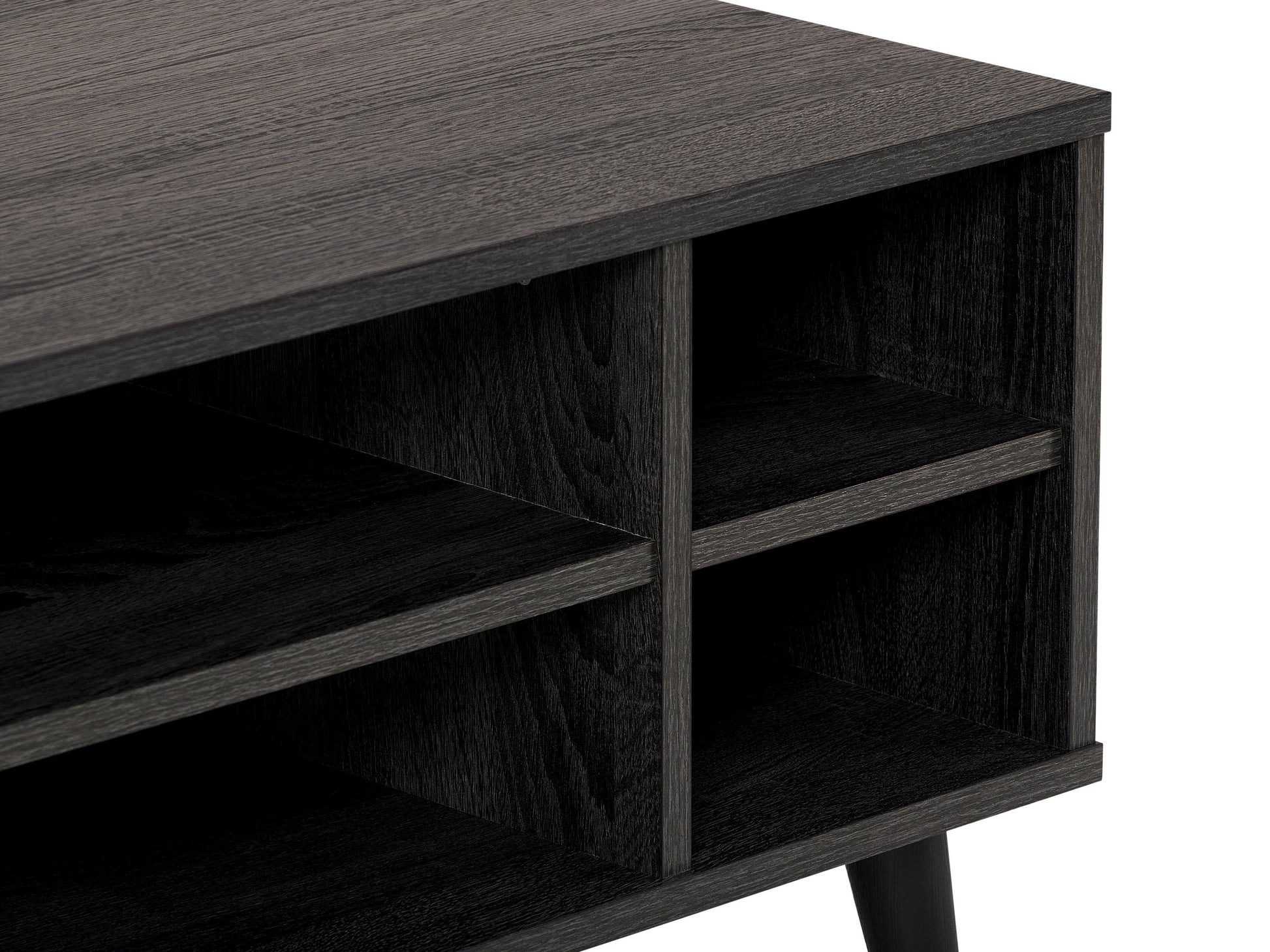 Dark grey rectangle coffee table with storage shelf, featuring a sleek wooden finish and minimalist design. Ideal for modern living rooms, providing ample space for books, decor, and essentials.