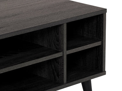 Dark grey rectangle coffee table with storage shelf, featuring a sleek wooden finish and minimalist design. Ideal for modern living rooms, providing ample space for books, decor, and essentials.