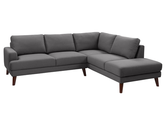 Dark grey sectional sofa with right-facing chaise, featuring plush cushions, modern design, and durable fabric upholstery. Ideal for contemporary living rooms.