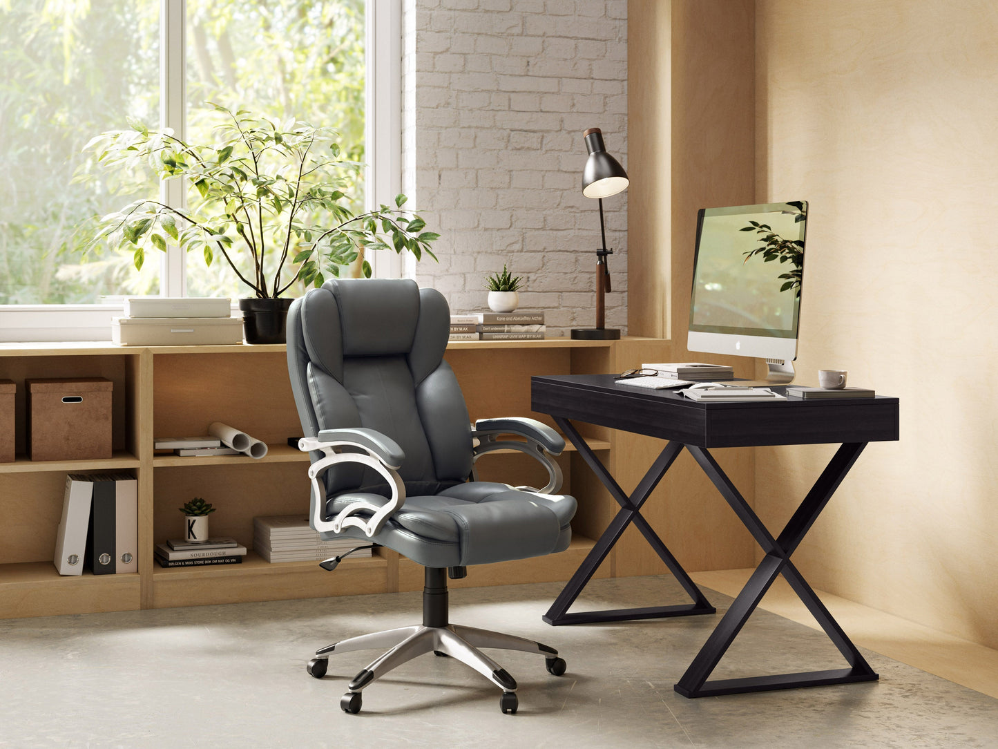 Grey executive office chair with ergonomic design, adjustable height, padded armrests, and breathable mesh back. Ideal for home or office use, this stylish chair combines comfort with modern aesthetics.
