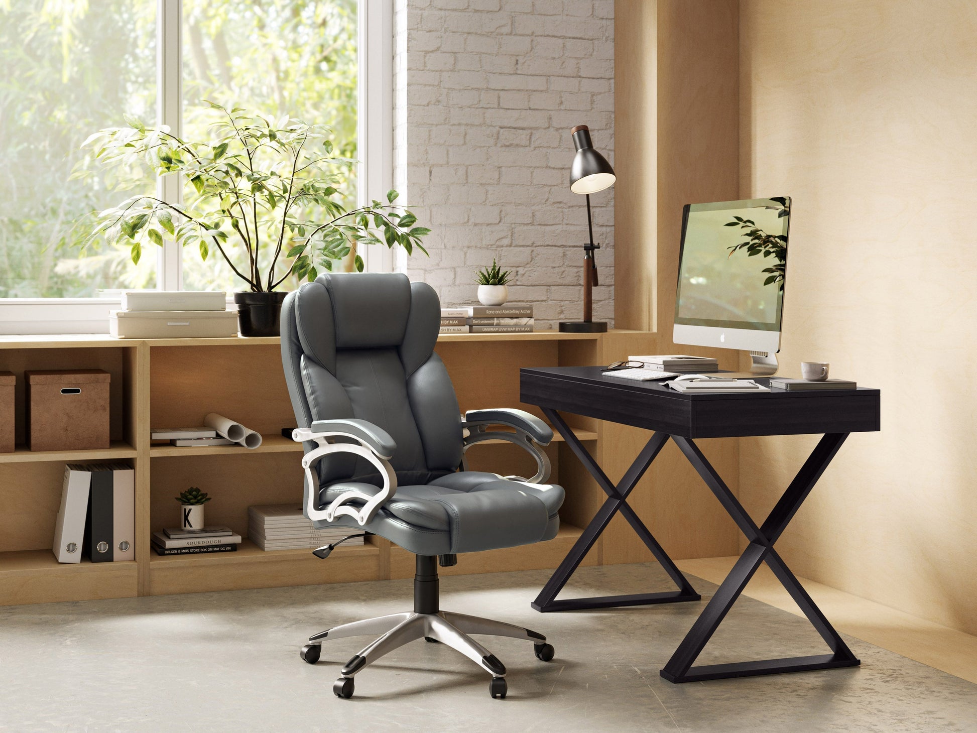 Grey executive office chair with ergonomic design, adjustable height, padded armrests, and breathable mesh back. Ideal for home or office use, this stylish chair combines comfort with modern aesthetics.