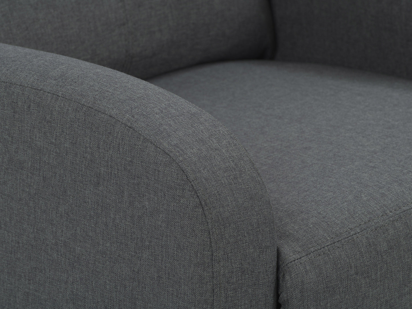 Dark grey push back recliner with plush cushioning, sleek armrests, and durable fabric upholstery. Ideal for living rooms, this comfortable and stylish chair features a reclining mechanism for ultimate relaxation.