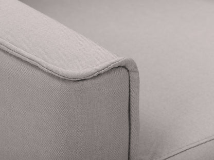Light grey mid-century recliner with wooden legs, tufted back, and soft fabric upholstery, perfect for modern living rooms.