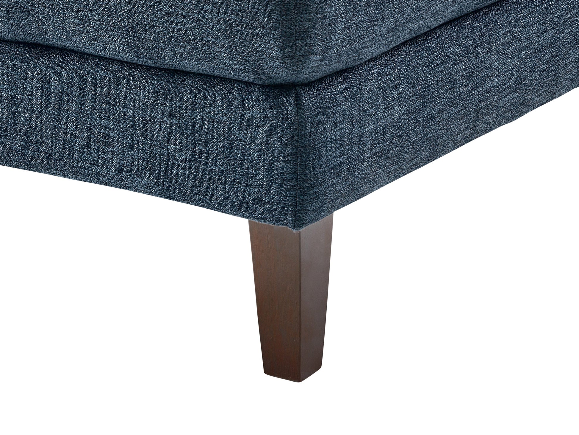 Modern blue sectional sofa, right-facing with plush cushions, sleek lines, and a durable fabric finish, perfect for contemporary living rooms. Features include adjustable headrests and stainless steel legs for added style and support.
