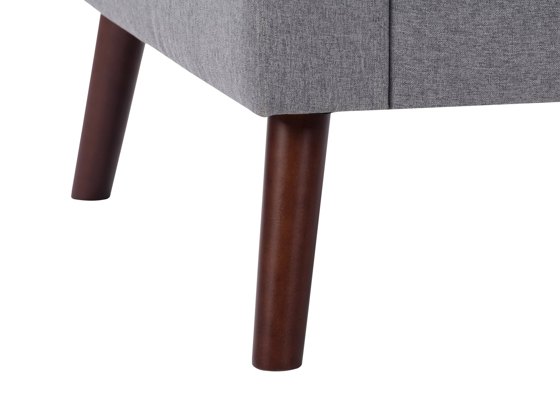 Grey tufted accent chair with wooden legs, featuring soft fabric upholstery, button-tufted backrest, and cushioned seat for comfort. Ideal for living rooms or reading nooks.