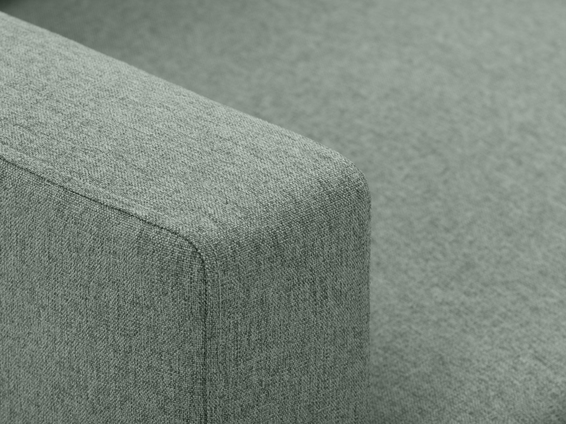 Green tufted accent chair with wooden legs, mid-century modern design, velvet upholstery, and button-tufted backrest.