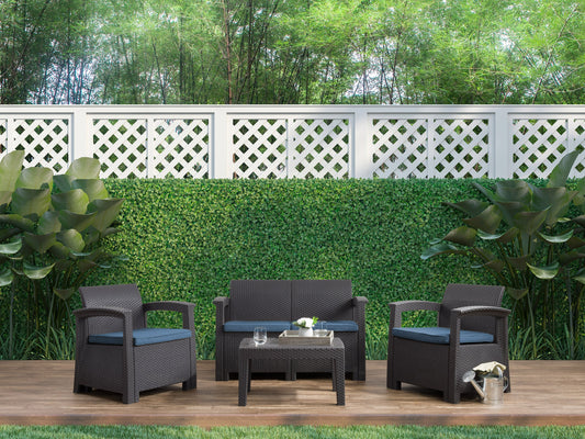 Blue 4-piece patio conversation set with cushioned seats, rattan wicker frame, glass-top coffee table, and weather-resistant materials, ideal for outdoor lounging and entertaining.