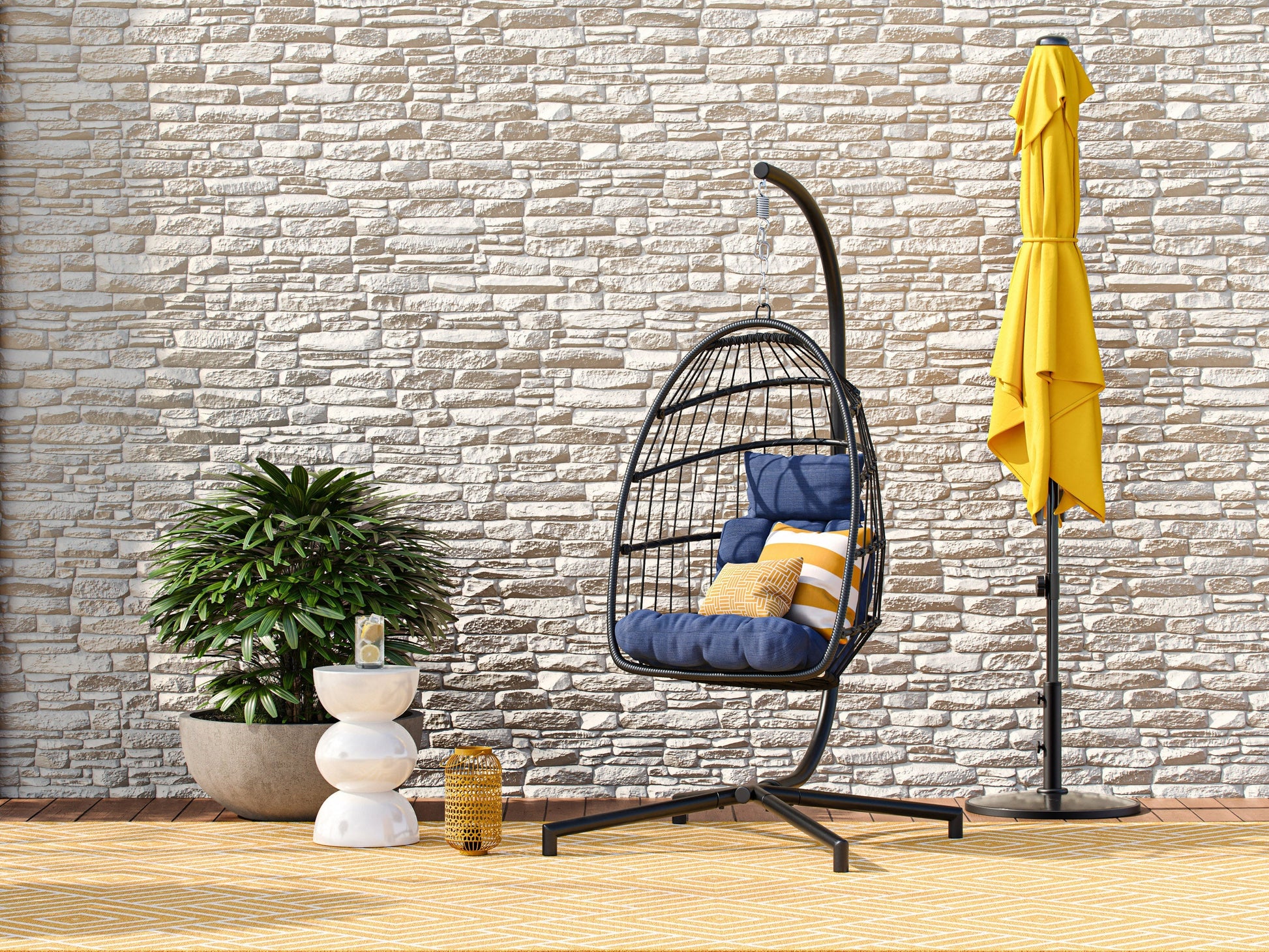 Blue hanging egg chair with cushioned seat, woven rattan design, and sturdy metal stand, perfect for patio relaxation.