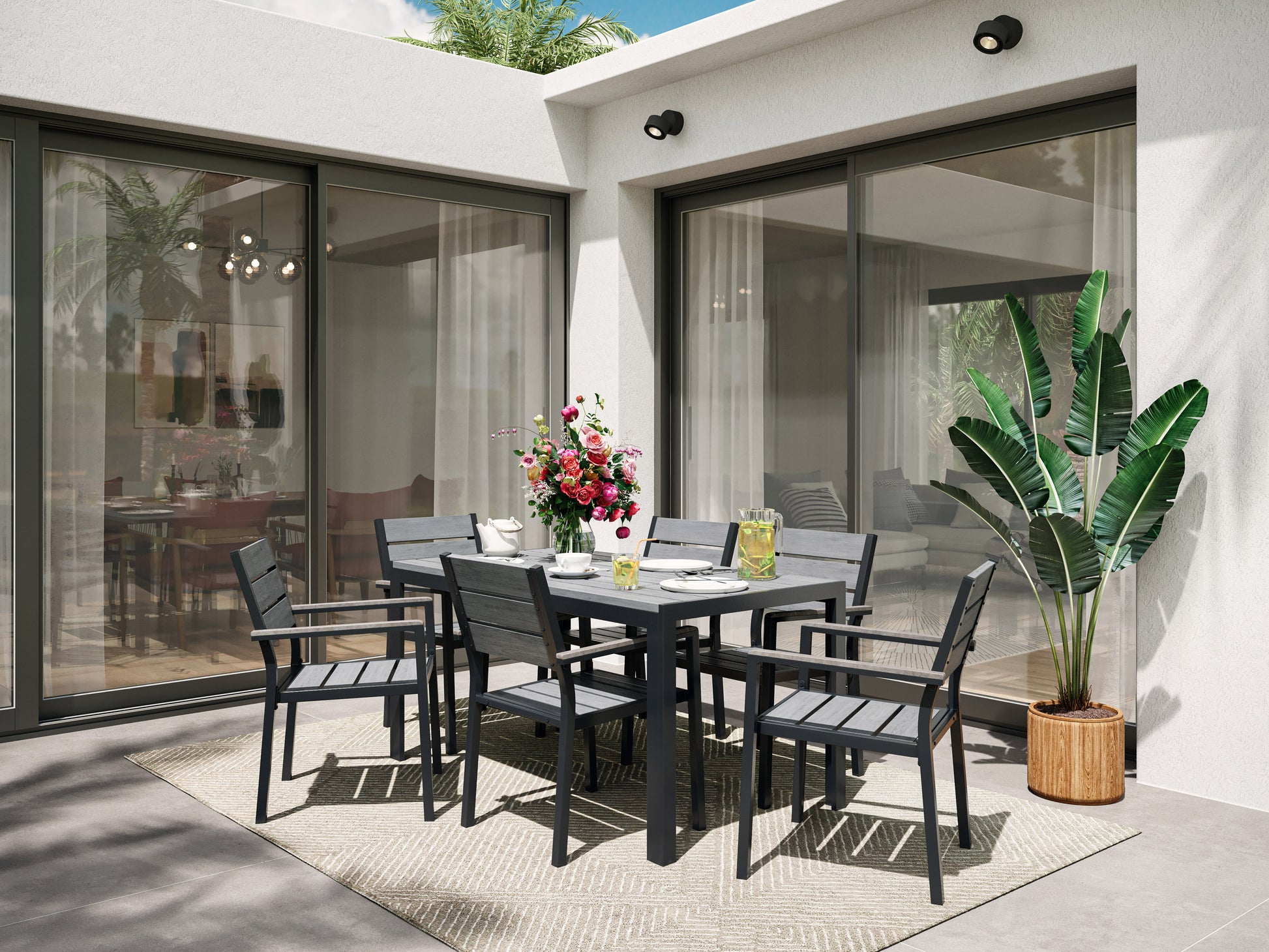 Modern outdoor patio dining set with six cushioned chairs and a rectangular wooden table, featuring a sleek black metal frame and weather-resistant materials, perfect for garden or backyard gatherings.